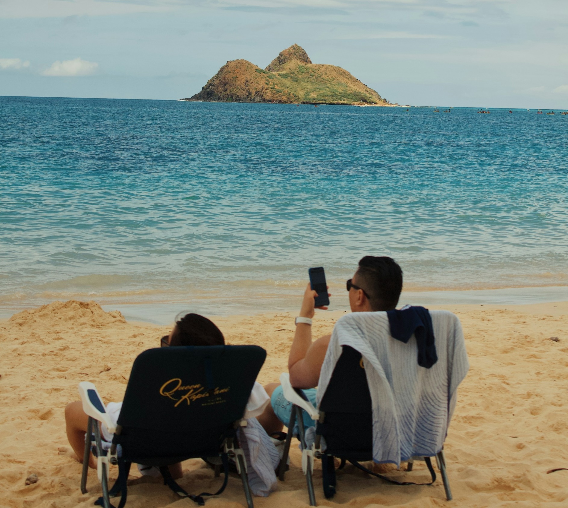 Military couple on a beach on island of oahu in Hawaii