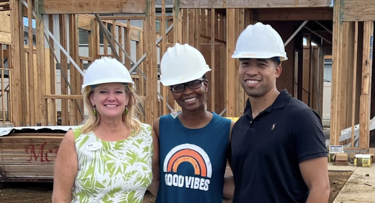 maryjo mcgillicuddy best ewa beach realtor with two happy clients