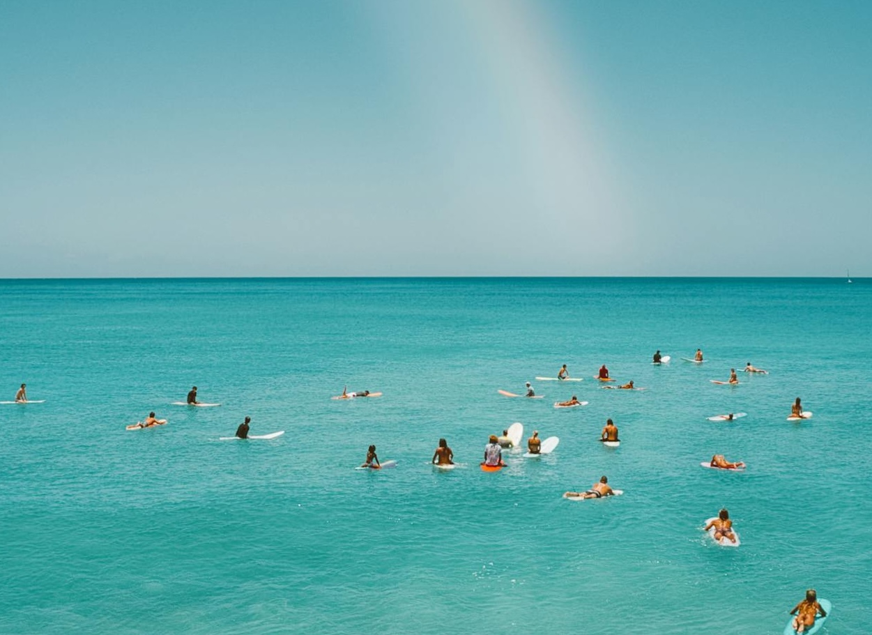 ocean pointe lifestyle surfing the southside of oahu on a beautiful day