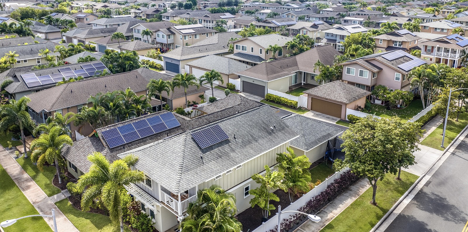 Luxury single family home in Kapolei Hawaii with modern architecture and mountain views
